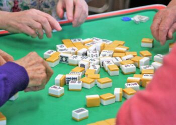 Mind Games from East and West: Comparing Mahjong Zen to Deck-Building Focus